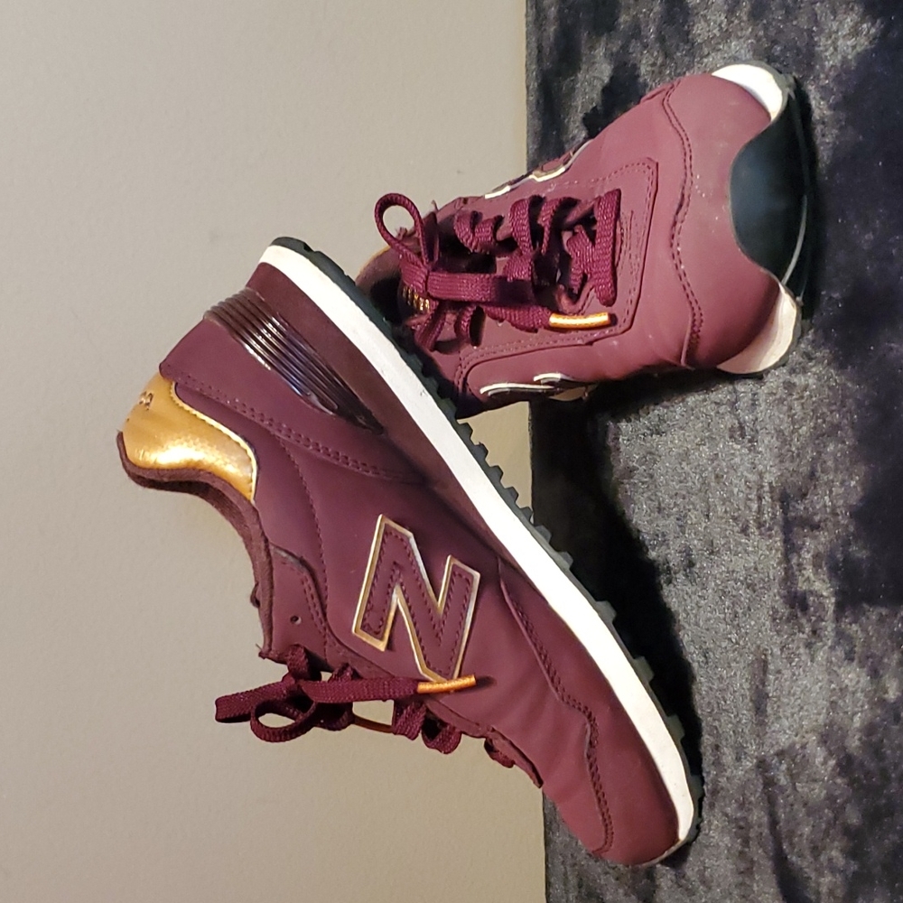 New Balance 515 wine red/gold sneakers. Size 7. Great pre-loved condition!